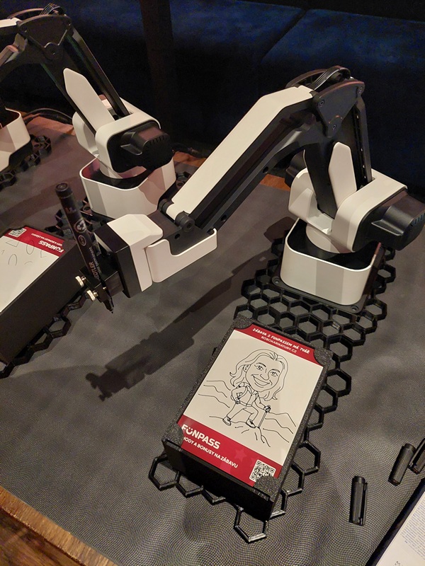 AI karikatury - robotické ruce